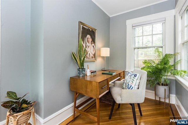 office area with crown molding, baseboards, and wood finished floors