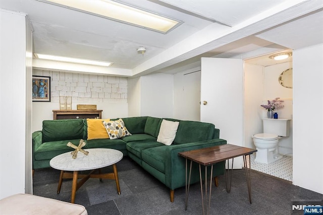living area featuring carpet flooring