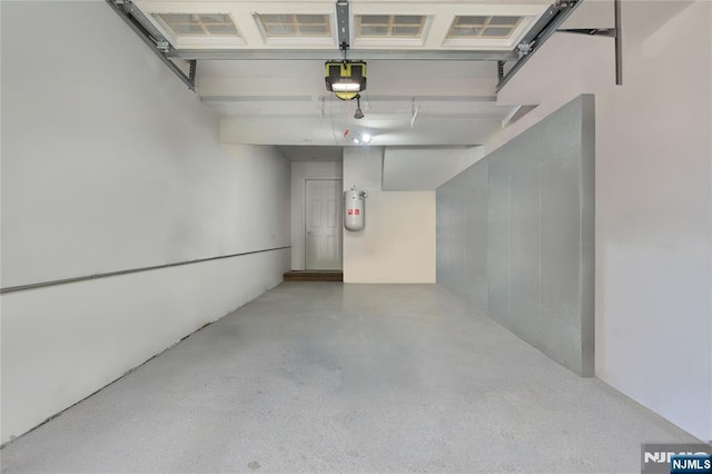 202 Blue Heron Dr, Secaucus, NJ 07094 - garage featuring a garage door opener