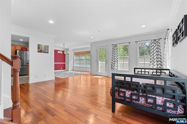 202 Blue Heron Dr, Secaucus, NJ 07094 - living room with recessed lighting, ornamental molding, and light wood-type flooring