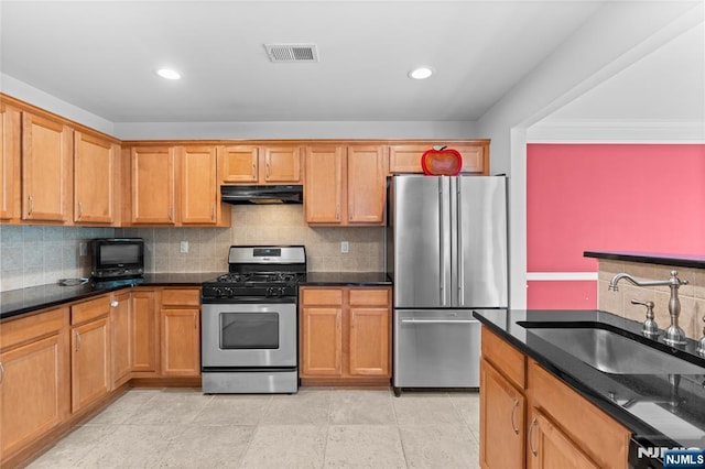 202 Blue Heron Dr, Secaucus, NJ 07094 - kitchen with a sink, stainless steel appliances, tasteful backsplash, under cabinet range hood, and visible vents