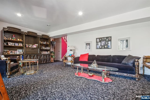 living room featuring carpet flooring and recessed lighting