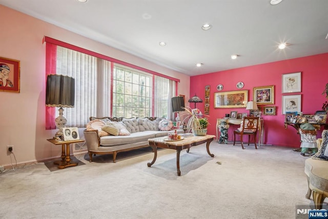 living area with carpet floors, recessed lighting, and baseboards