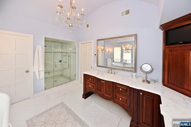 bathroom with visible vents, vanity, a chandelier, and a shower stall