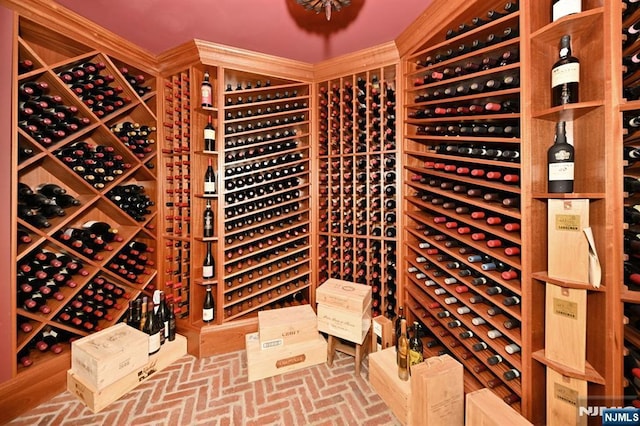 wine room with brick floor