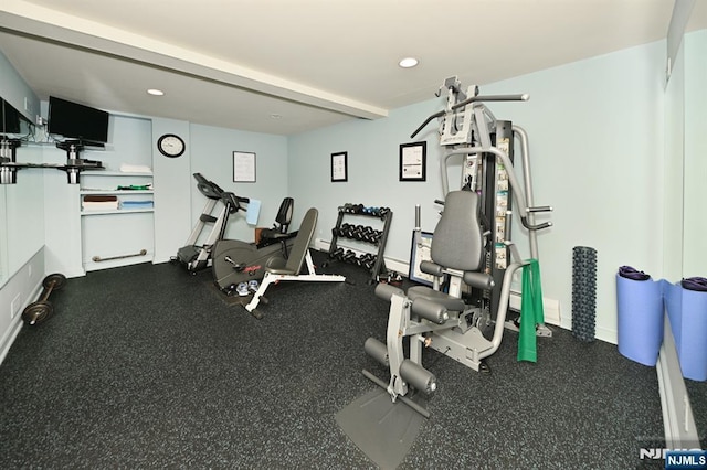 workout area featuring recessed lighting