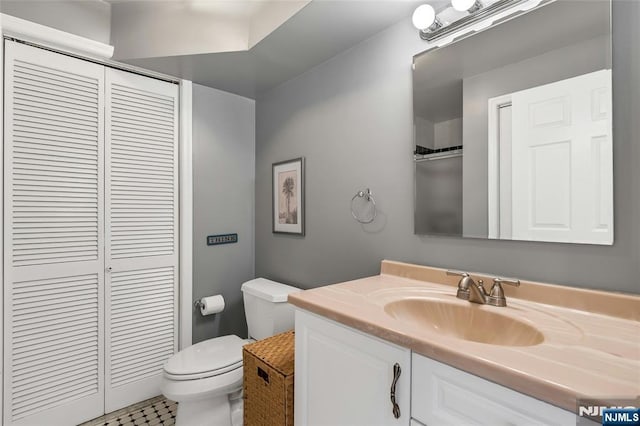 99 Park Ave Unit 5D, Hoboken, NJ 07030 - bathroom featuring vanity, toilet, and a closet