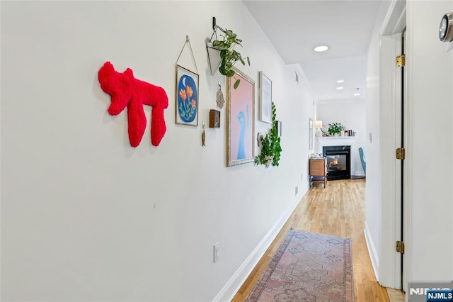 99 Park Ave Unit 5D, Hoboken, NJ 07030 - corridor featuring recessed lighting, baseboards, and light wood-type flooring