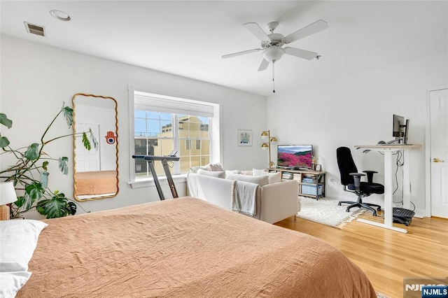 99 Park Ave Unit 5D, Hoboken, NJ 07030 - bedroom featuring visible vents, ceiling fan, and wood finished floors