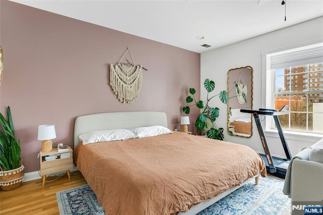 99 Park Ave Unit 5D, Hoboken, NJ 07030 - bedroom featuring baseboards, light wood finished floors, and visible vents