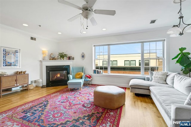 99 Park Ave Unit 5D, Hoboken, NJ 07030 - living area featuring crown molding, visible vents, and wood finished floors