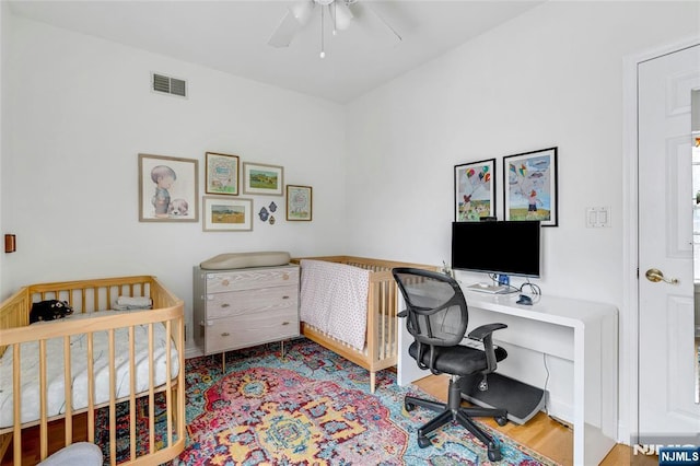 99 Park Ave Unit 5D, Hoboken, NJ 07030 - bedroom with ceiling fan, wood finished floors, and visible vents