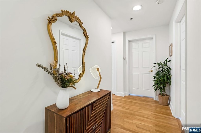 99 Park Ave Unit 5D, Hoboken, NJ 07030 - hallway with baseboards and light wood-type flooring
