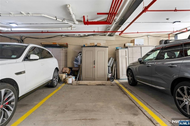 99 Park Ave Unit 5D, Hoboken, NJ 07030 - parking garage with concrete block wall