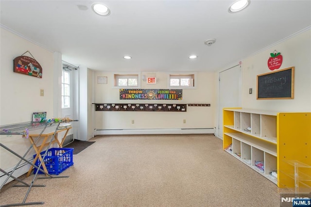 recreation room featuring recessed lighting, crown molding, and carpet floors