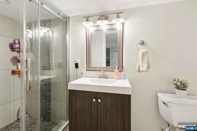 785 Ridgewood Rd, Twp Of Washington, NJ 07676 - bathroom with toilet, vanity, and a shower stall