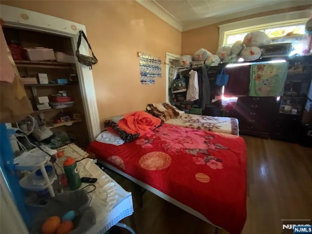 6314 Broadway, West New York, NJ 07093 - bedroom with wood finished floors and crown molding