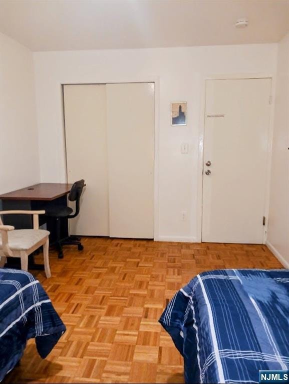 1215 Bergenline Ave, Union City, NJ 07087 - bedroom featuring a closet and baseboards