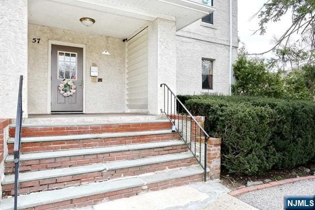 57 Brookway Ave Unit 2C, Englewood, NJ 07631 - doorway to property with stucco siding