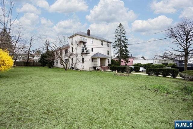 57 Brookway Ave Unit 2C, Englewood, NJ 07631 - view of yard featuring fence