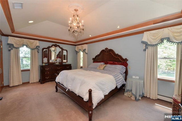 bedroom with a baseboard heating unit, light colored carpet, a raised ceiling, a chandelier, and crown molding