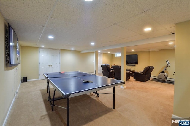 recreation room featuring carpet, baseboards, baseboard heating, recessed lighting, and a paneled ceiling