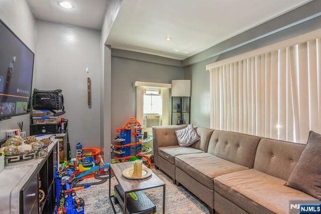 living area featuring recessed lighting