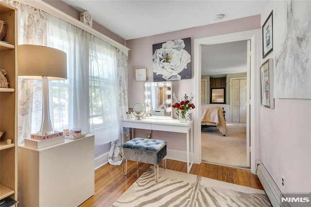 400 Prospect Ave, Oradell, NJ 07649 - entrance foyer with plenty of natural light, hardwood / wood-style floors, and a baseboard heating unit