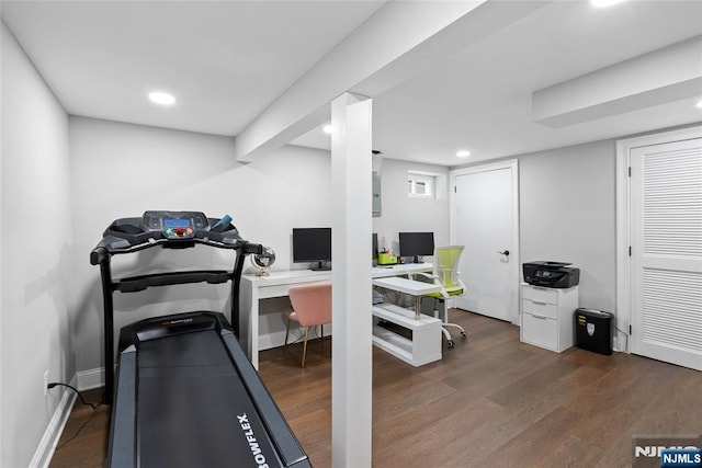 exercise area with recessed lighting and wood finished floors