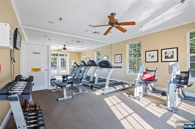 workout area featuring a ceiling fan, french doors, visible vents, and plenty of natural light
