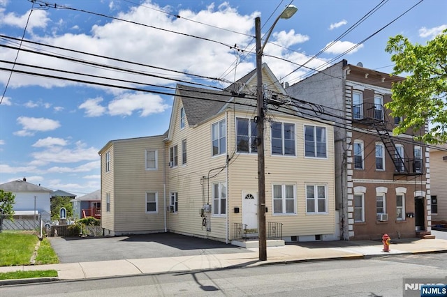 view of side of home with a residential view
