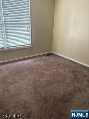 55 2nd St, South Orange Village, NJ 07079 - carpeted empty room with baseboards