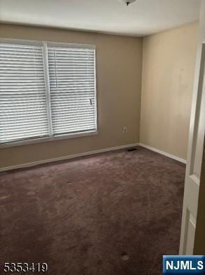 55 2nd St, South Orange Village, NJ 07079 - carpeted empty room with baseboards