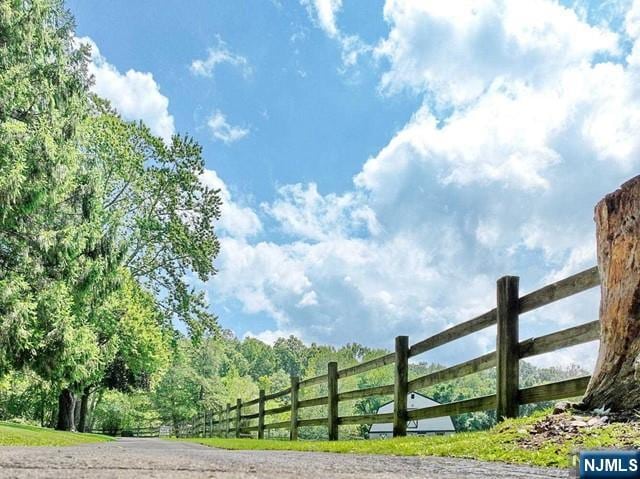 view of gate featuring fence