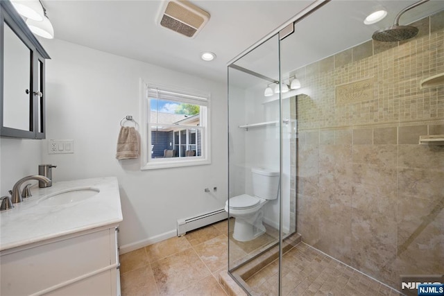 bathroom with a stall shower, a baseboard heating unit, toilet, baseboards, and visible vents