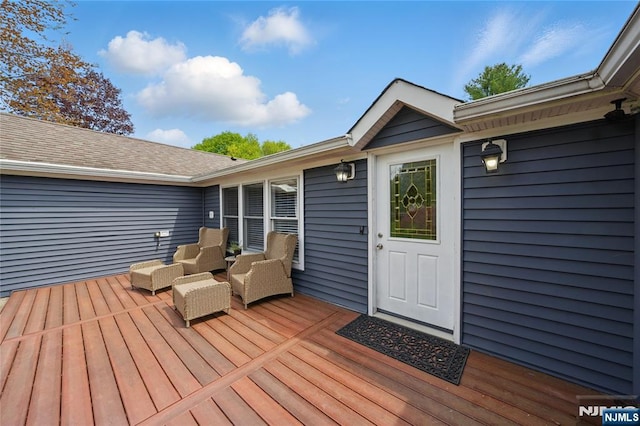 deck featuring an outdoor living space