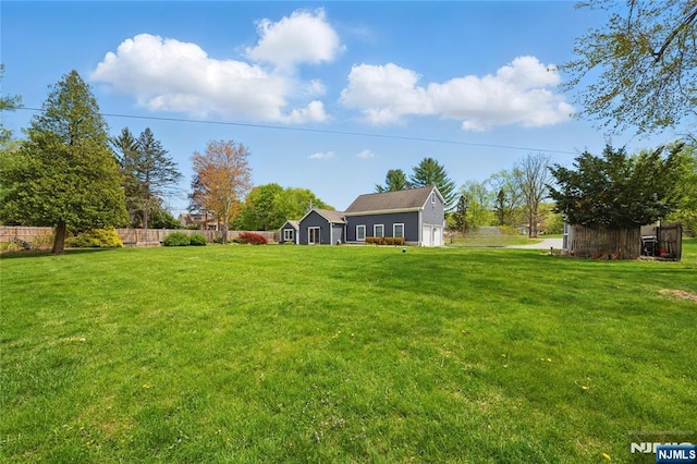 view of yard with fence