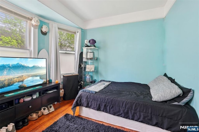 bedroom featuring wood finished floors