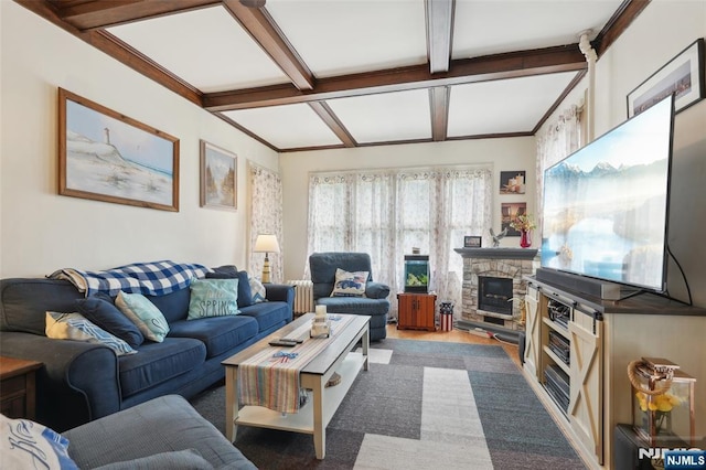 living area featuring coffered ceiling, a fireplace, beam ceiling, and wood finished floors