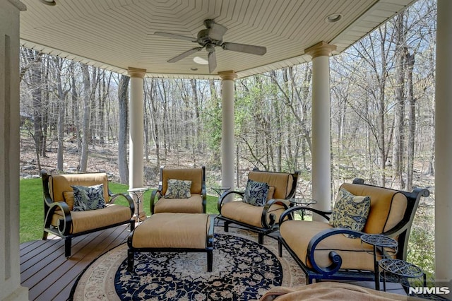 sunroom with an outdoor hangout area and a ceiling fan