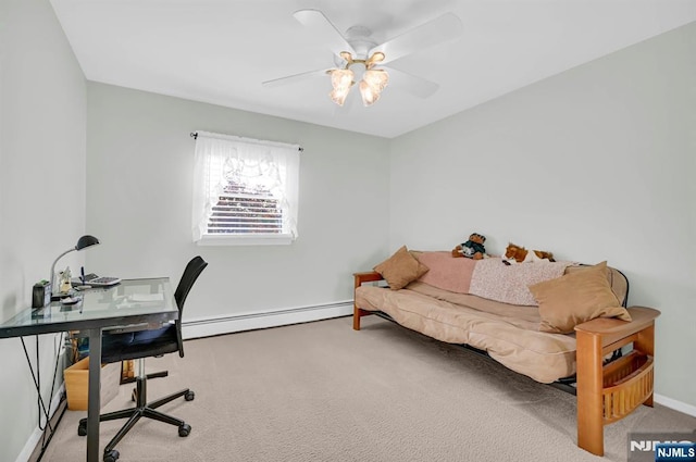 carpeted office featuring a baseboard radiator, baseboards, and a ceiling fan