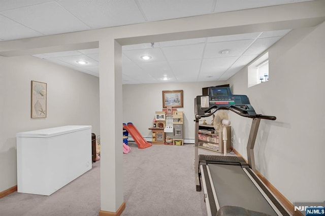 workout area featuring recessed lighting, a drop ceiling, baseboards, and carpet floors