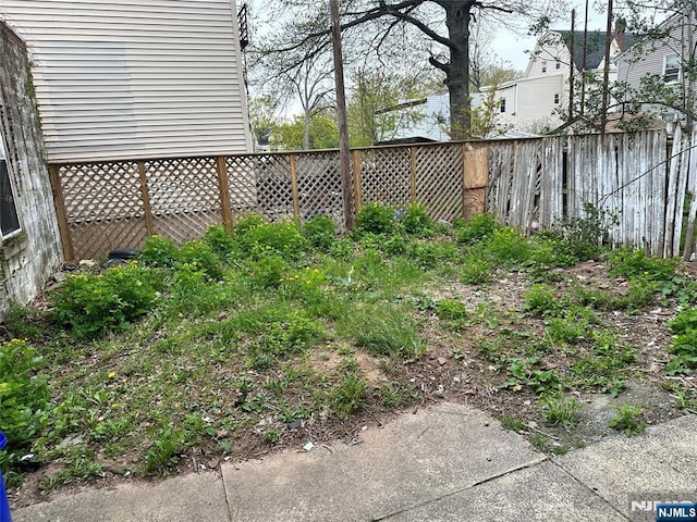 view of yard with fence