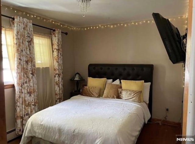 257 Palisade Ave, Garfield, NJ 07026 - bedroom featuring a baseboard radiator