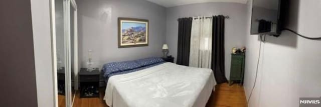 257 Palisade Ave, Garfield, NJ 07026 - bedroom featuring wood finished floors