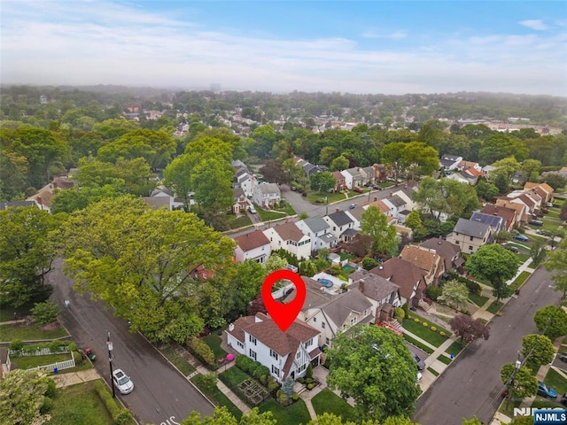 aerial overview of property's location with nearby suburban area