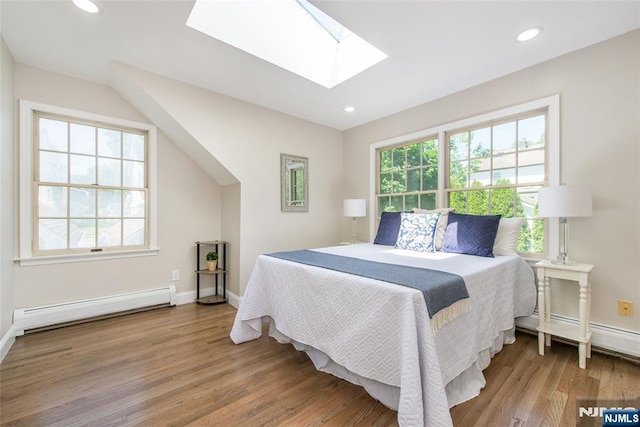 434 Argyle St, Oradell, NJ 07649 - bedroom featuring a baseboard radiator, a skylight, wood finished floors, recessed lighting, and baseboards
