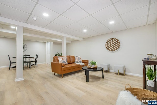 434 Argyle St, Oradell, NJ 07649 - living room featuring light wood-style floors, baseboards, recessed lighting, and a drop ceiling