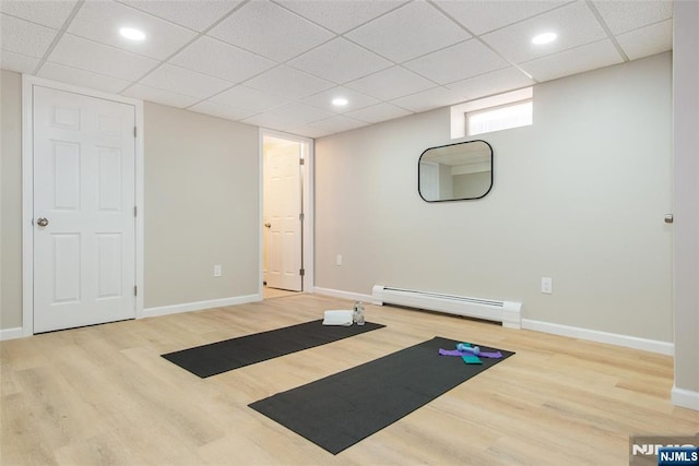 434 Argyle St, Oradell, NJ 07649 - workout room featuring a baseboard heating unit, wood finished floors, baseboards, a drop ceiling, and recessed lighting