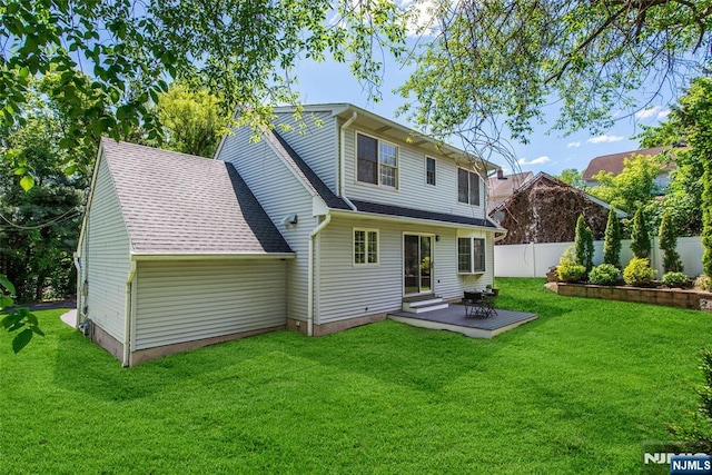 434 Argyle St, Oradell, NJ 07649 - rear view of property featuring a patio area and roof with shingles